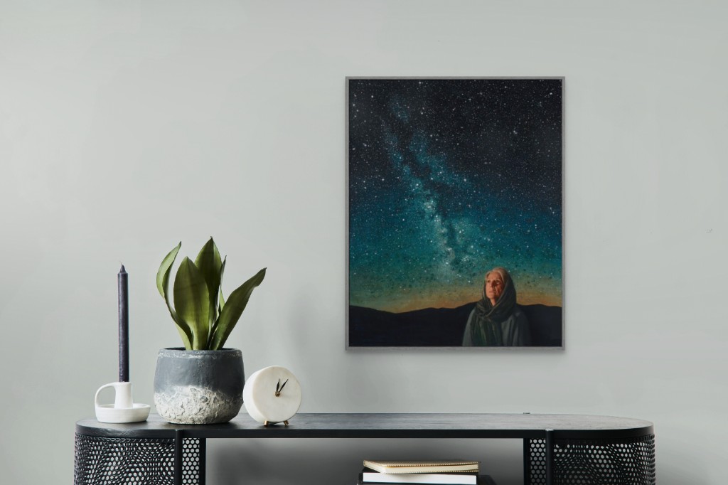 Print above a dark dresser with a snake plant
